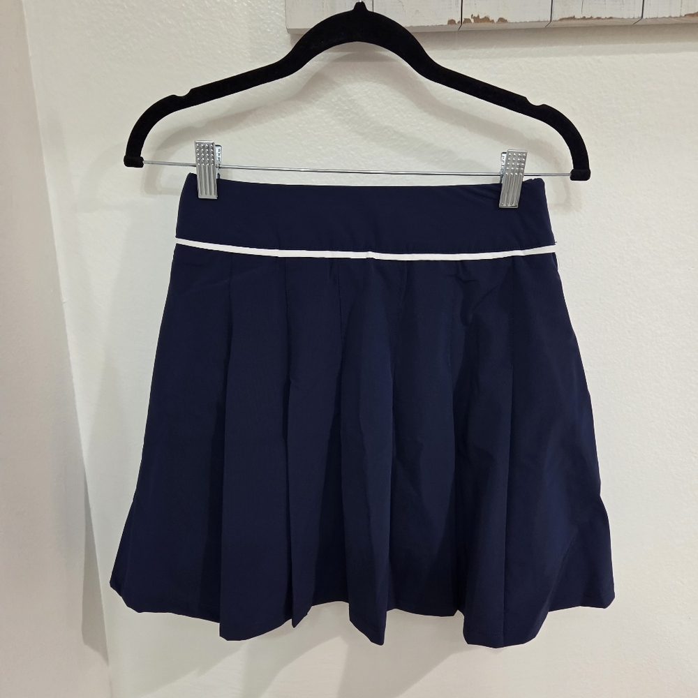 Izod Performance Naiomy Pleated Skort - Picture 5 of 8